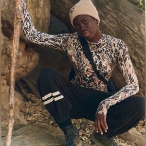 Free People Movement Misty Morning Top Faded Leopard NWT Sz MEDIUM